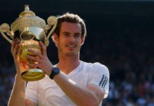 Andy Murray lifts the Wimbledon Trophy after his dramatic triumph in the Men's Singles 2013